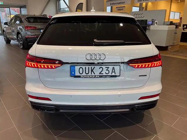 實拍奧迪A6旅行版，白色漆面更加時尚-有駕